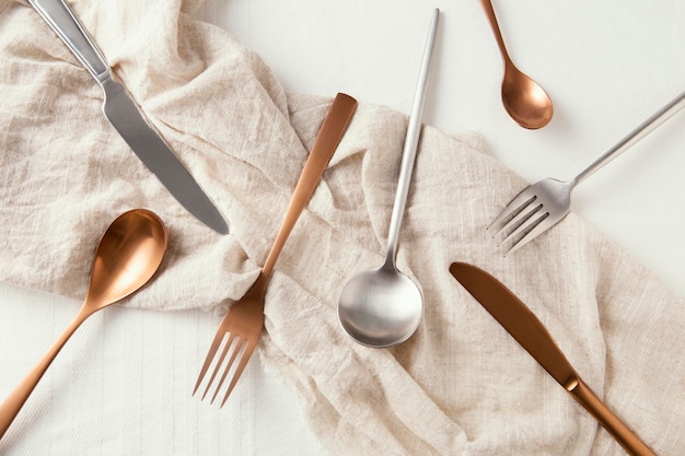 Top view arrangement of beautiful tableware on the table