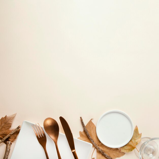 Top view arrangement of beautiful tableware with copy space