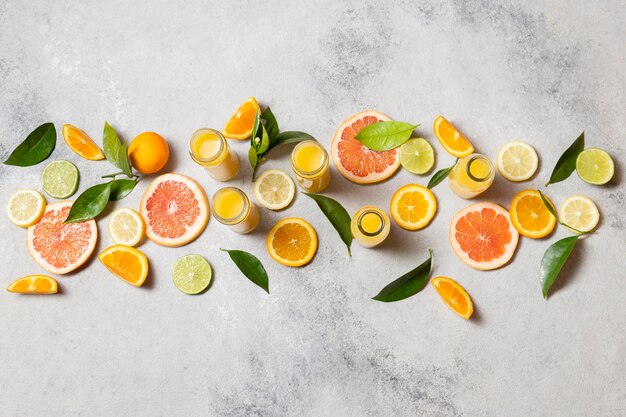 Top view arrangement of citrus with juice