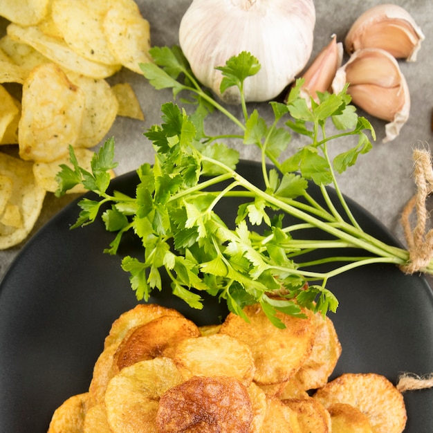 Top view arrangement of delicious potato chips