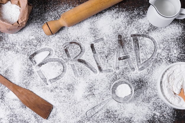 Top view arrangement for homemade bread and flour