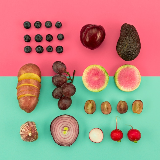 Top view arrangement of red veggies and fruit
