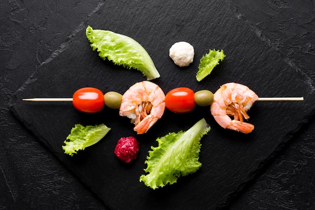 Free photo top view arrangement shrimp meal