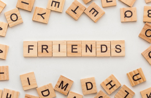 Free photo top view arrangement of still life friendship day elements