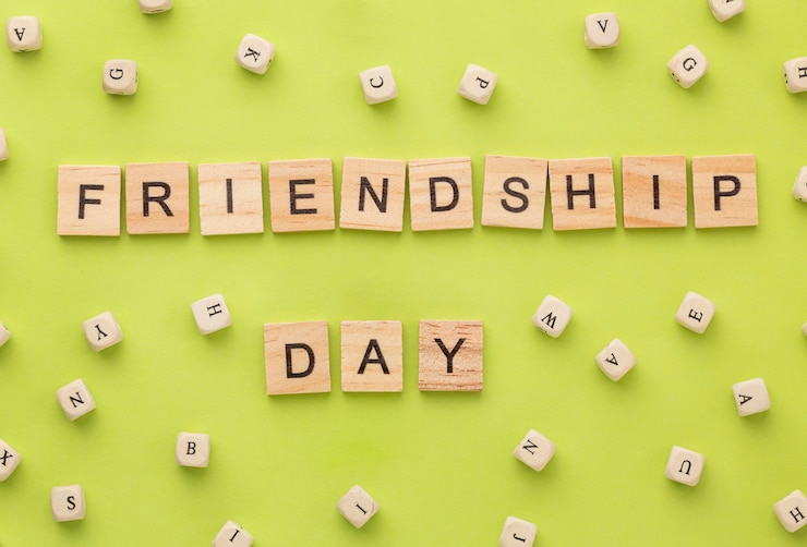 Free Photo top view arrangement of still life friendship day elements