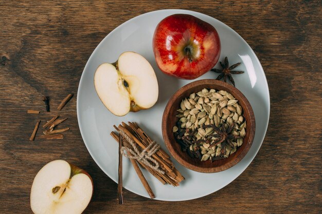 Top view arrangement with apples on plate