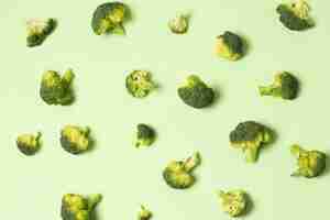 Free photo top view arrangement with cauliflower on green background