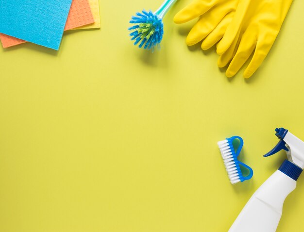 Top view arrangement with cleaning products and copy-space