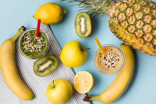 Top view arrangement with fruity smoothies