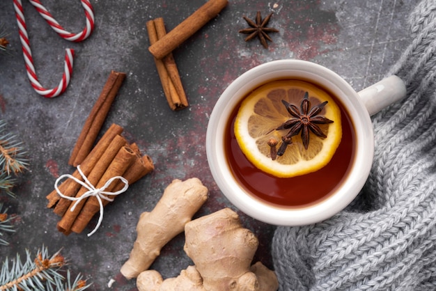 Free photo top view arrangement with hot tea and lemon