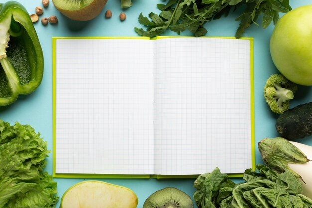 Top view arrangement with meal planning notebook