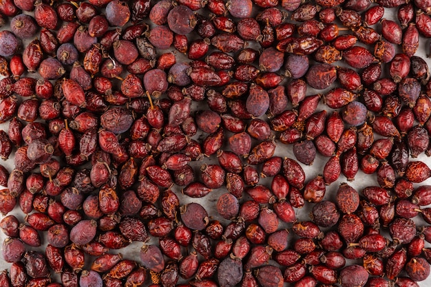 Free photo top view arrangement with red dried fruits