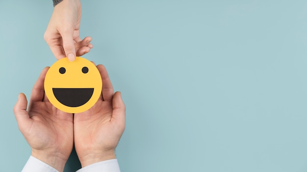 top view arrangement with a smiley emoji card