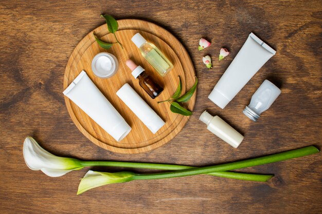 Top view arrangement with spa items on wooden background