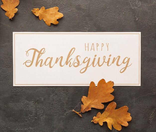 Top view arrangement with thanksgiving sign and leaves