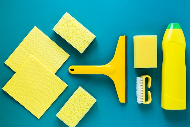 Top view arrangement with yellow cleaning products