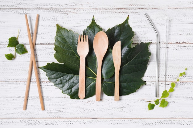 Top view arrangement of zero waste products on wooden background