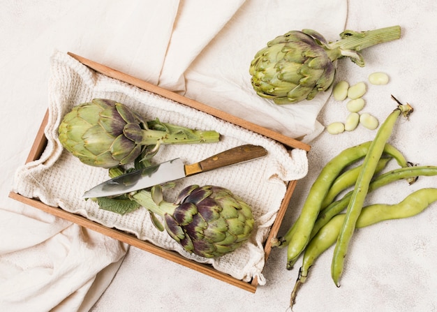 Free photo top view of artichokes and beans