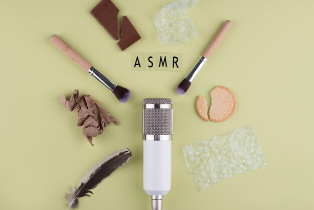 Top view of asmr microphone with objects for sound