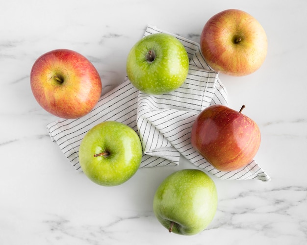 Top view of assortment of apples on table