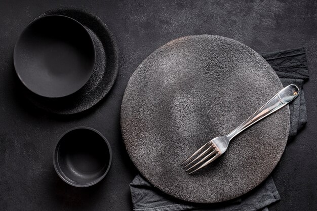 Top view assortment of black tableware