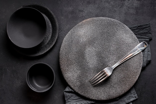 Top view assortment of black tableware