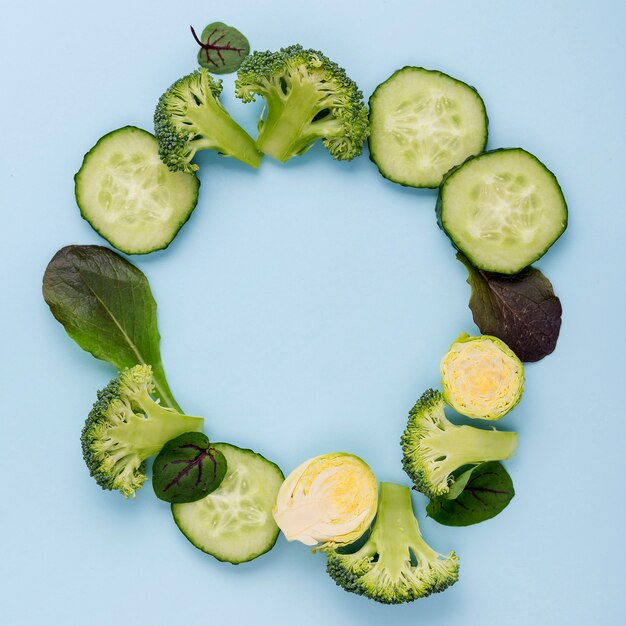 Top view assortment of cucumber slices with copy space