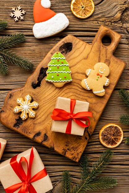 Top view assortment of delicious gingerbread and gifts