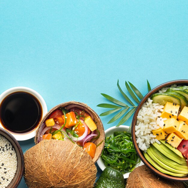 Top view assortment of delicious poke bowl