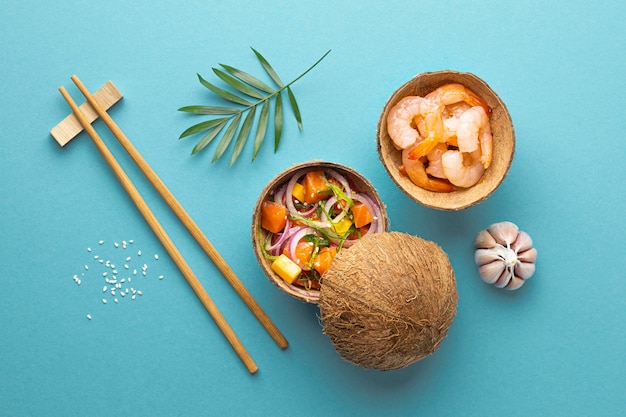 Top view assortment of delicious poke bowl