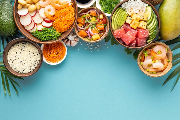 Top view assortment of delicious poke bowl