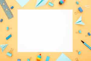 Free photo top view assortment of desk elements with empty card