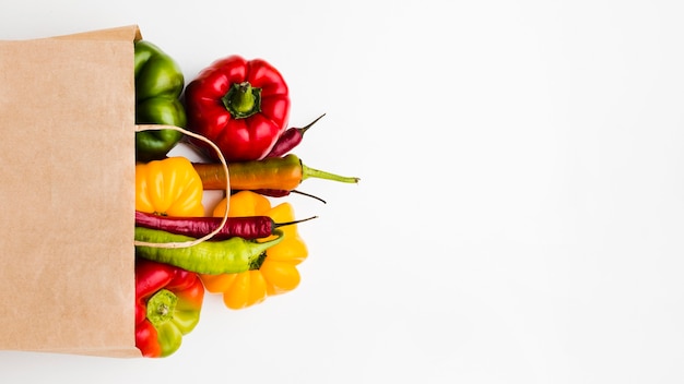 Top view assortment of different fresh vegetables with copy space