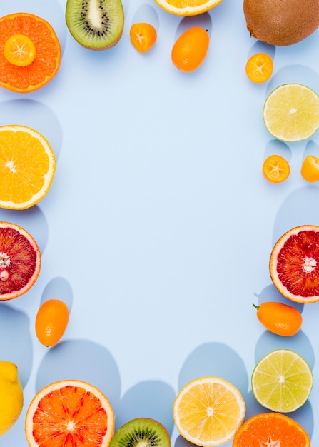 Top view assortment of organic fruits with copy space