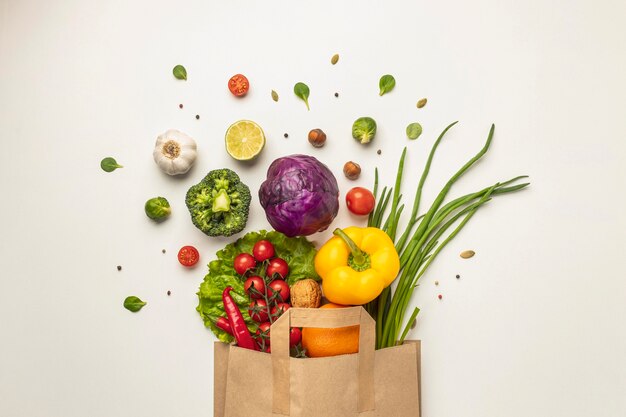 top view of assortment of vegetables in paper bag