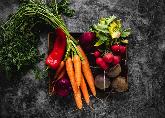 Top view assortment of veggies for salad