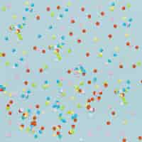 Free photo top view assortment with confetti on blue background