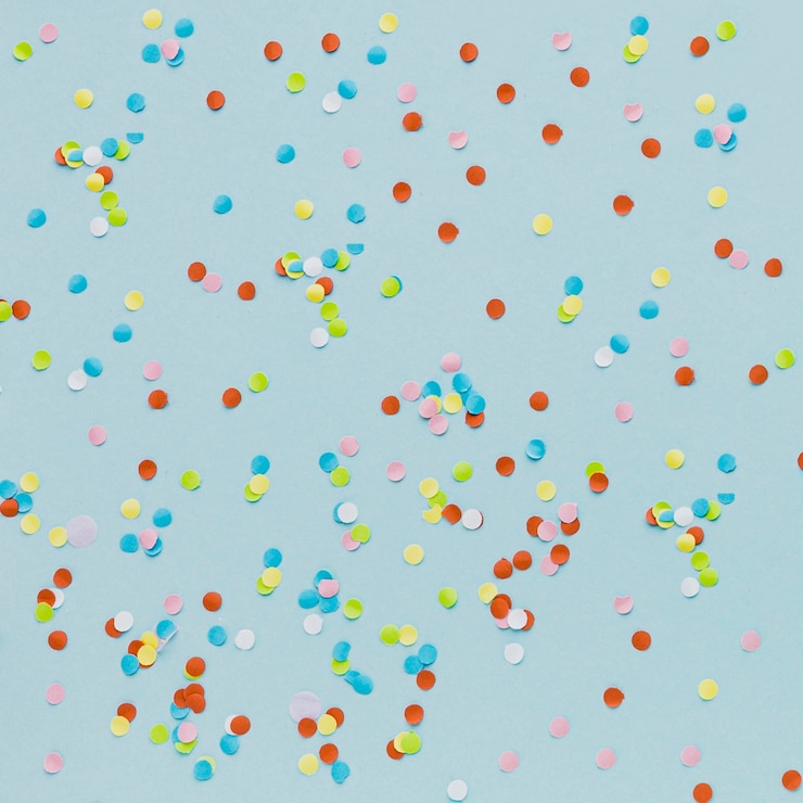 Free Photo top view assortment with confetti on blue background