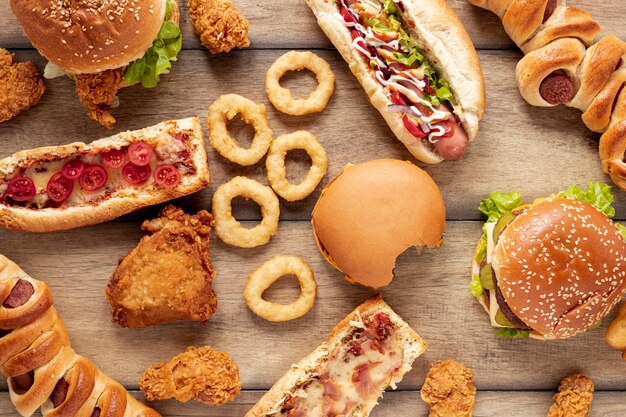 Top view assortment with delicious fast food