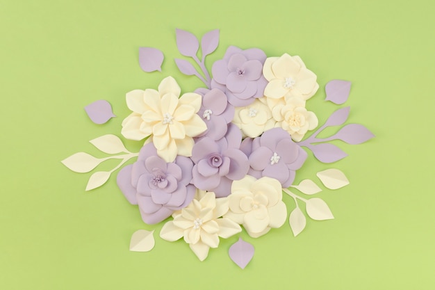 Top view assortment with flowers and green background