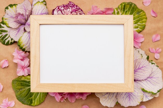 Top view assortment with frame and flowers