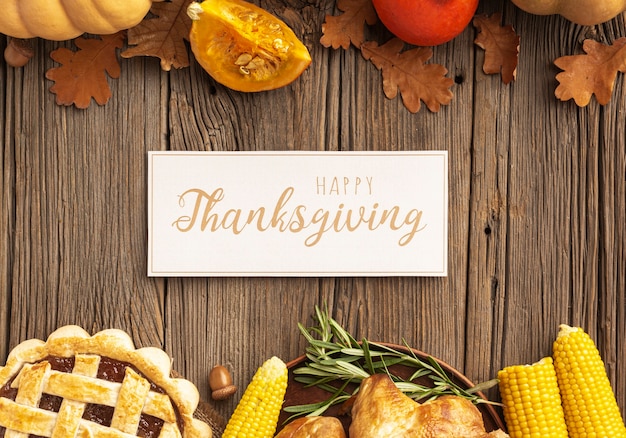 Free photo top view assortment with pumpkins and thanksgiving sign