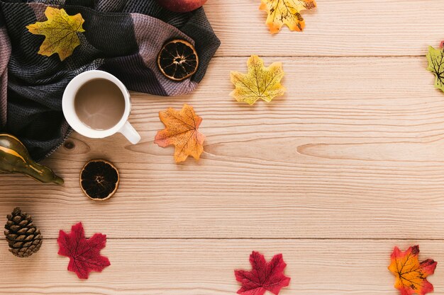 Top view autumn arrangement on wooden background