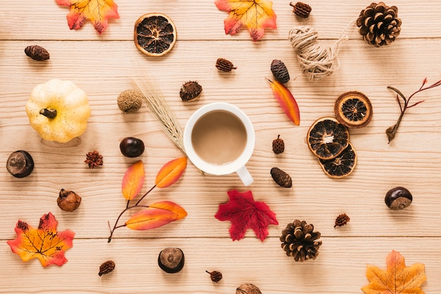 Top view autumn arrangement on wooden background