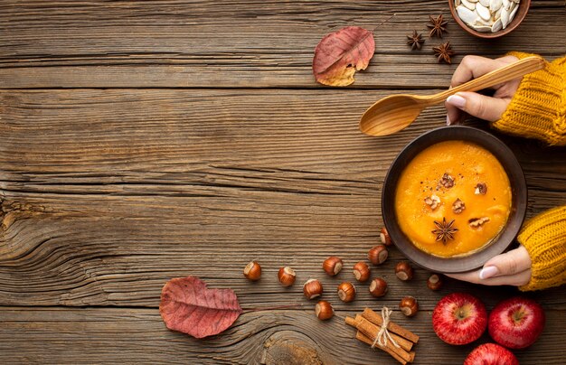 Top view autumn food pumpkin soup copy space