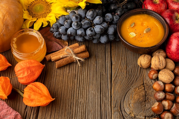 Top view autumn fruit and pumpkin soup