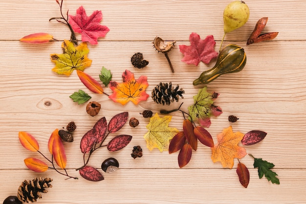 Top view autumn leaves on wooden table