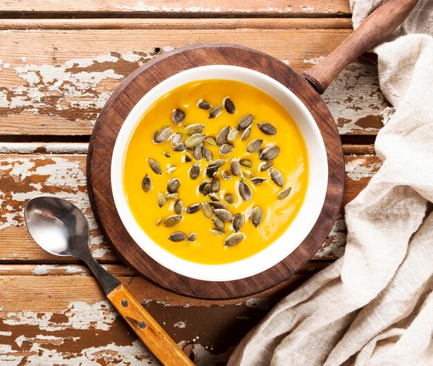 Top view of autumn squash soup with seeds