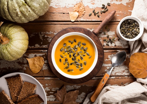 Top view of autumn squash soup with spoon