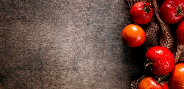 Top view of autumn tomatoes with copy space